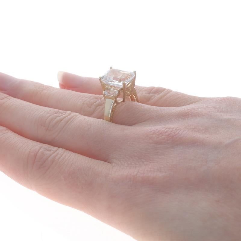 Yellow Gold White Topaz Three-Stone Ring - 10k Emerald Cut 5.18ctw For Sale 1