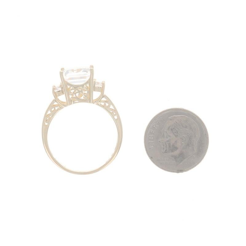 Yellow Gold White Topaz Three-Stone Ring - 10k Emerald Cut 5.18ctw For Sale 2
