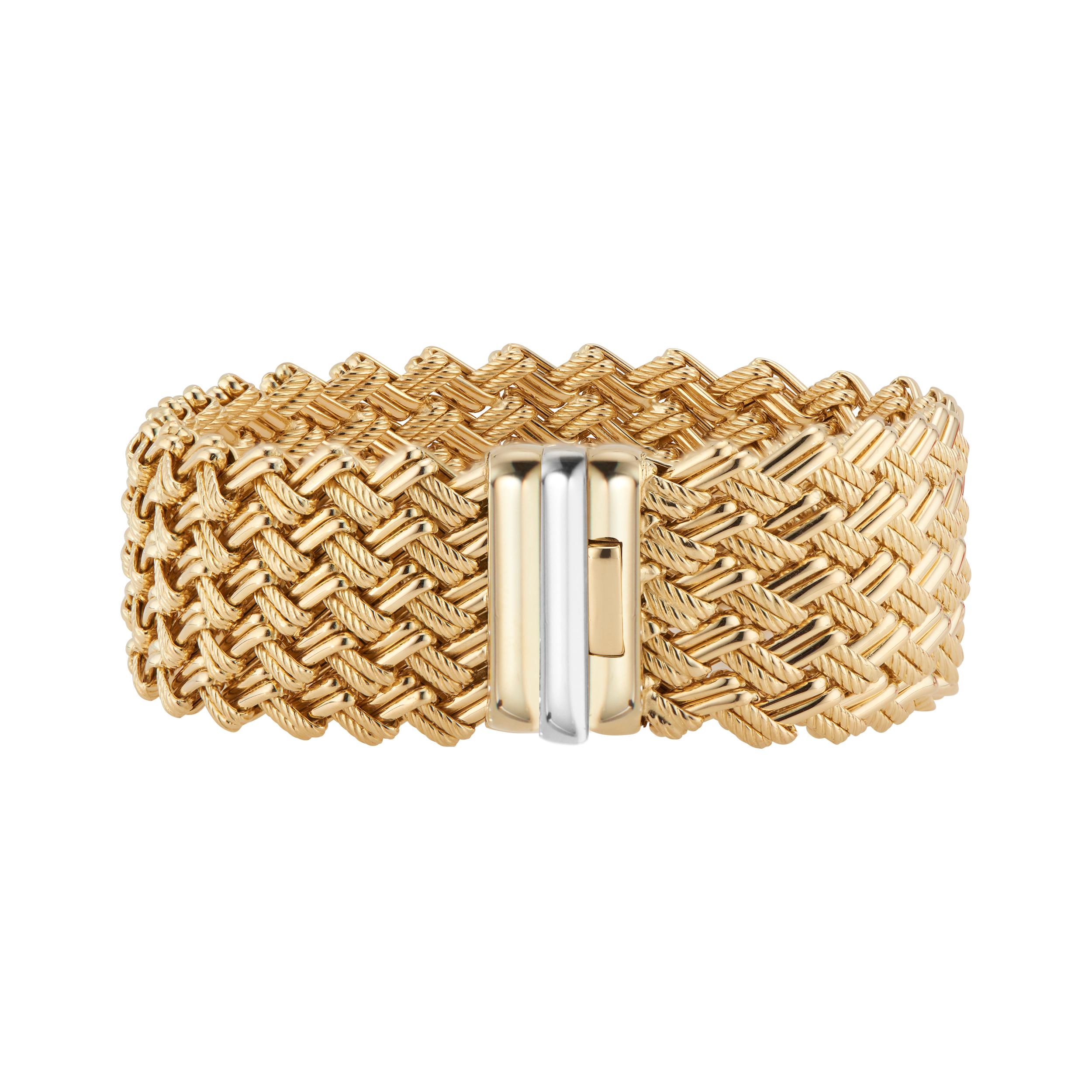 24.5mm wide 18k yellow gold wide woven Italian bracelet. 7.5 Inches

18k yellow gold 
Stamped: 18k
56.2 grams
Length: 7.5 Inches
Width: 24.5mm
Thickness/depth 4.2mm
