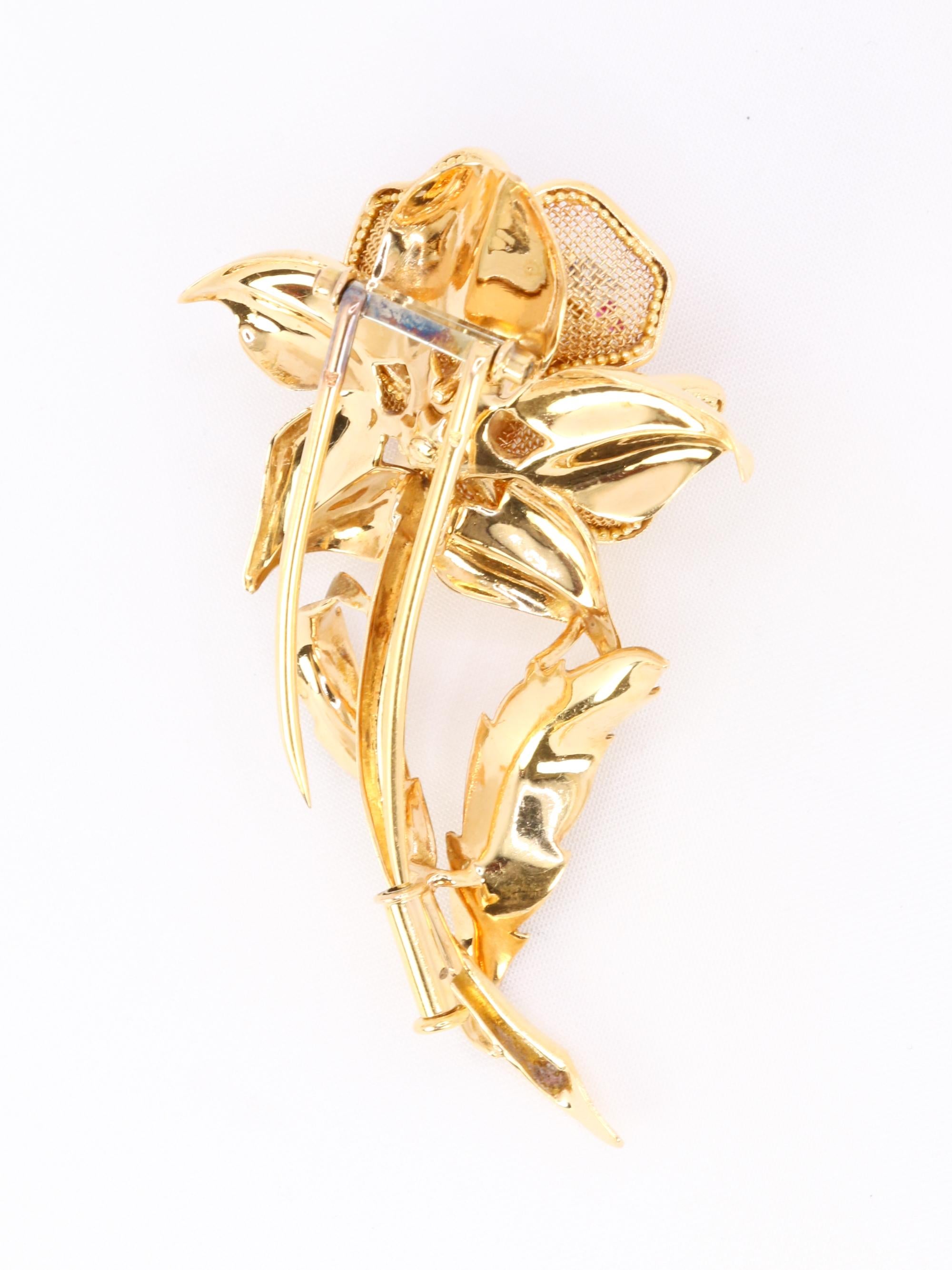 Retro Yellow Gold with diamonds, rubies, emeralds, and sapphires flower brooch For Sale