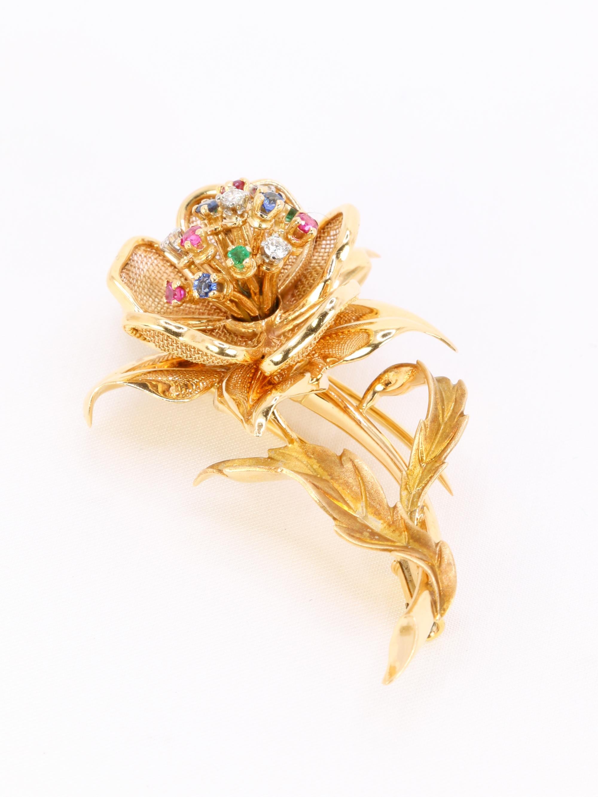 Round Cut Yellow Gold with diamonds, rubies, emeralds, and sapphires flower brooch For Sale