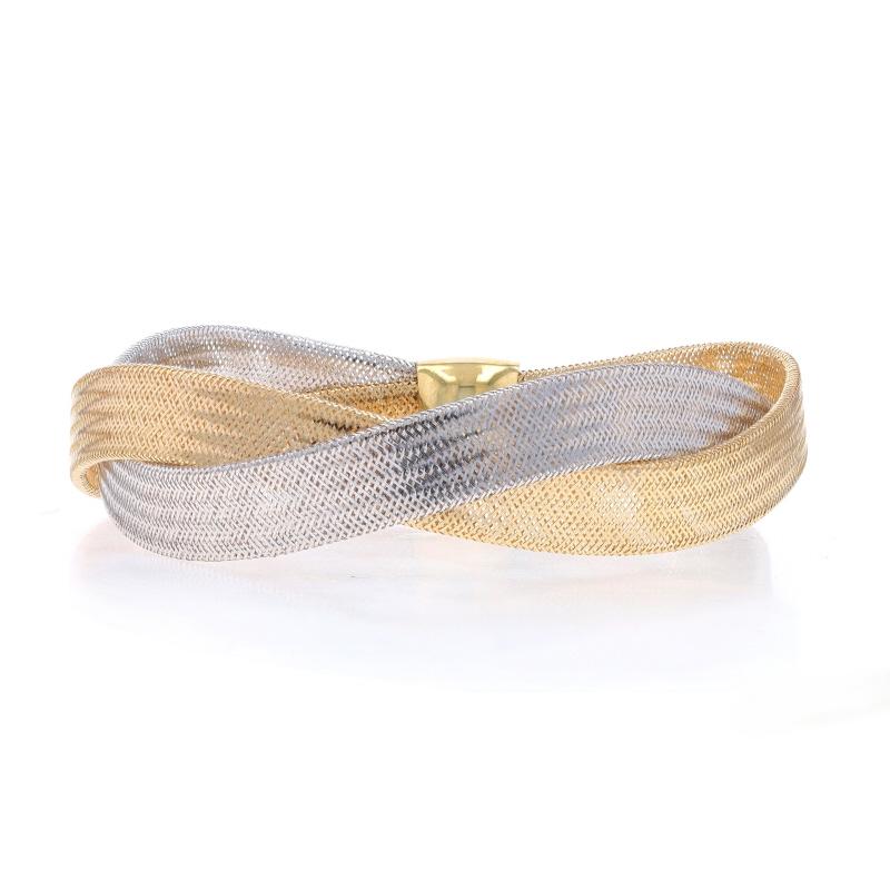 Metal Content: 14k Yellow Gold & 14k White Gold

Style: Single Station Bangle
Fastening Type: N/A (slides over wrist)
Theme: Twist
Features: Lightweight Design

Measurements
Inner Circumference: 8