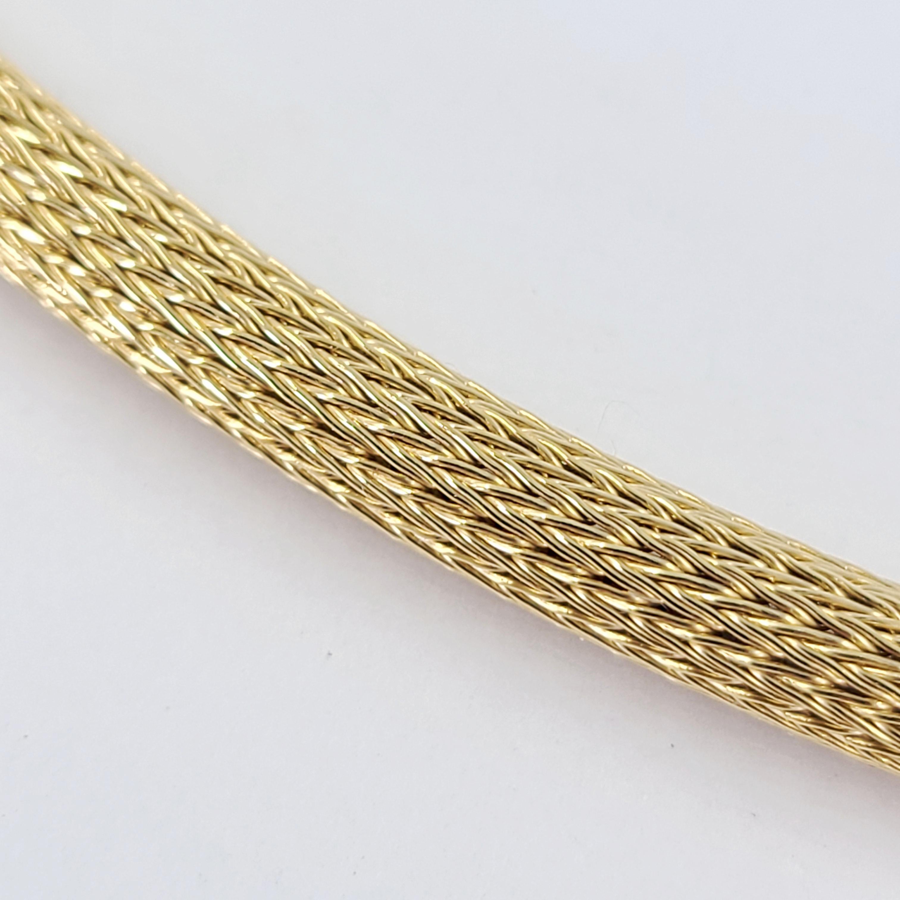 18 Karat Yellow Gold 4mm Woven Tube Necklace Measuring 17.5 Inches Long. Finished Weight Is 22.8 Grams. Twisting Lock Clasp.
