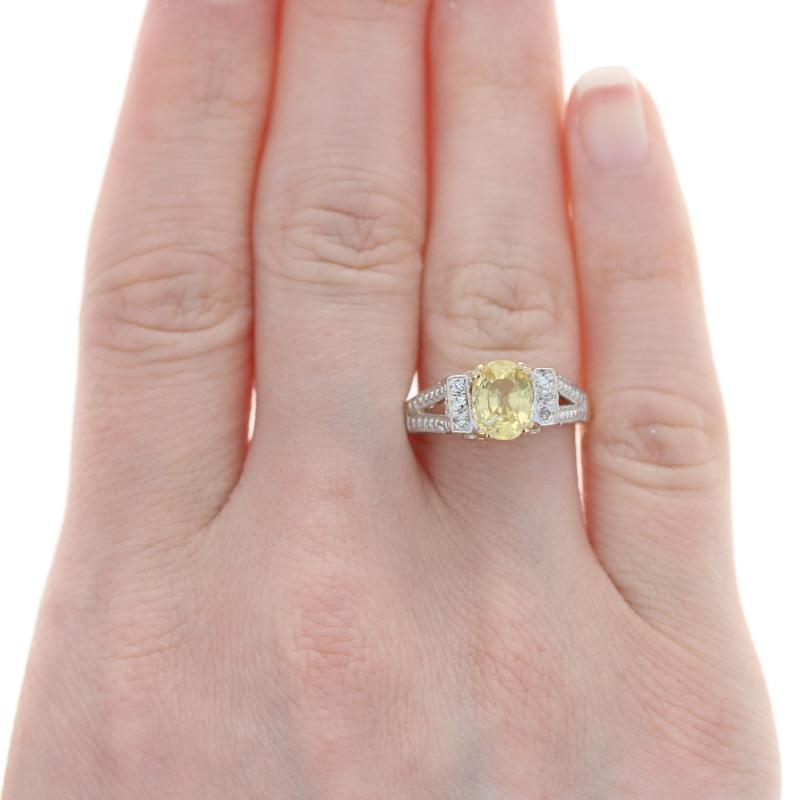 Size: 7
Sizing Fee: Up 2 sizes for $35 or Down 2 sizes for $30 

Metal Content: 14k Yellow Gold & 14k White Gold

Stone Information
Genuine Sapphire 
Treatment: Heating
Carat: 1.60ct
Cut: Oval
Color: Yellow
Size: 8mm x 6mm

Natural Diamonds
Carats:
