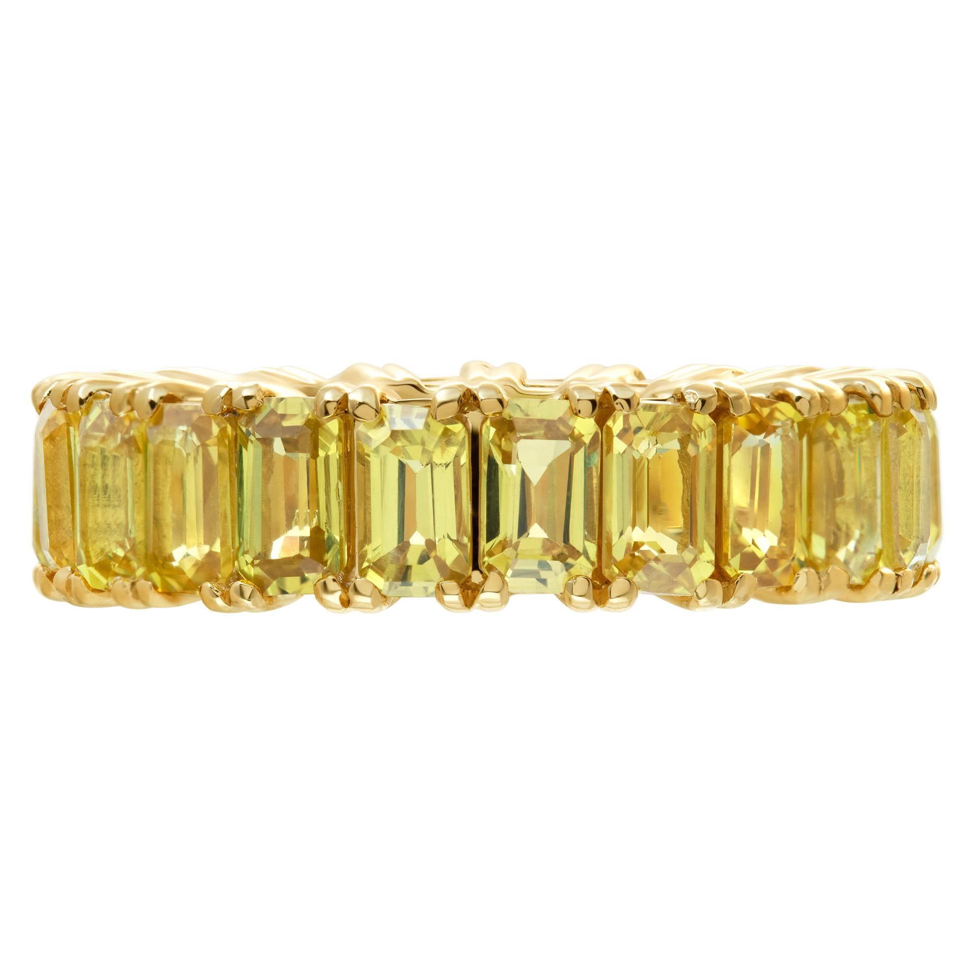 Yellow sapphire eternity band in 14k yellow gold with 7.60 carats in yellow sapphires. Size 7
