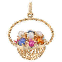 Colgante de oro amarillo con circonio, rubí, perla, esmeralda, zafiro y flor en racimo 14k