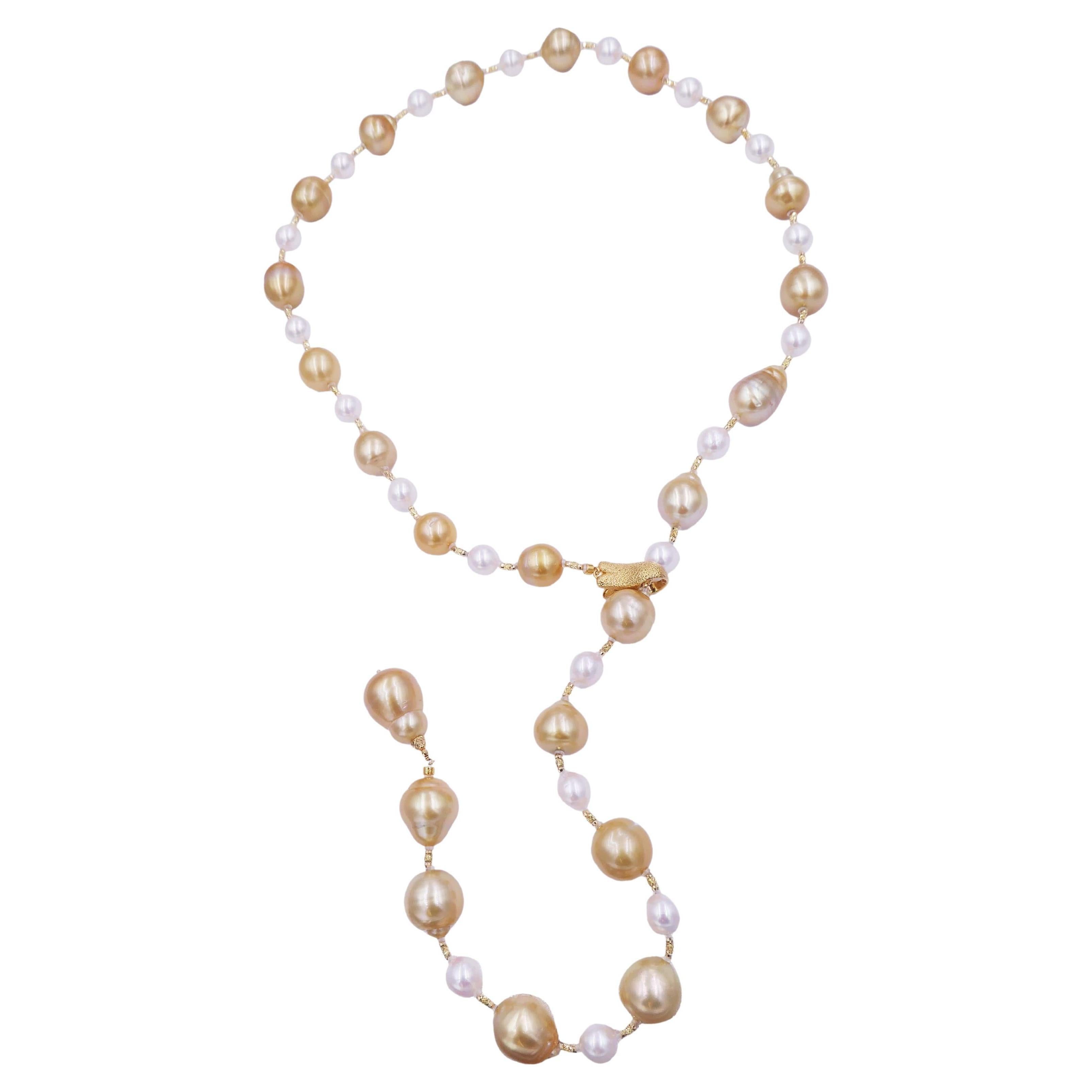 Yellow Golden White South Sea Pearls 18K Gold Adjustable Lariat Clasp Necklace
18 Karat Yellow Gold
South Sea Pearls *Golden & White
AA Quality
Adjustable Length From Choker to 24 inches lariat / clasp can be attached anywhere