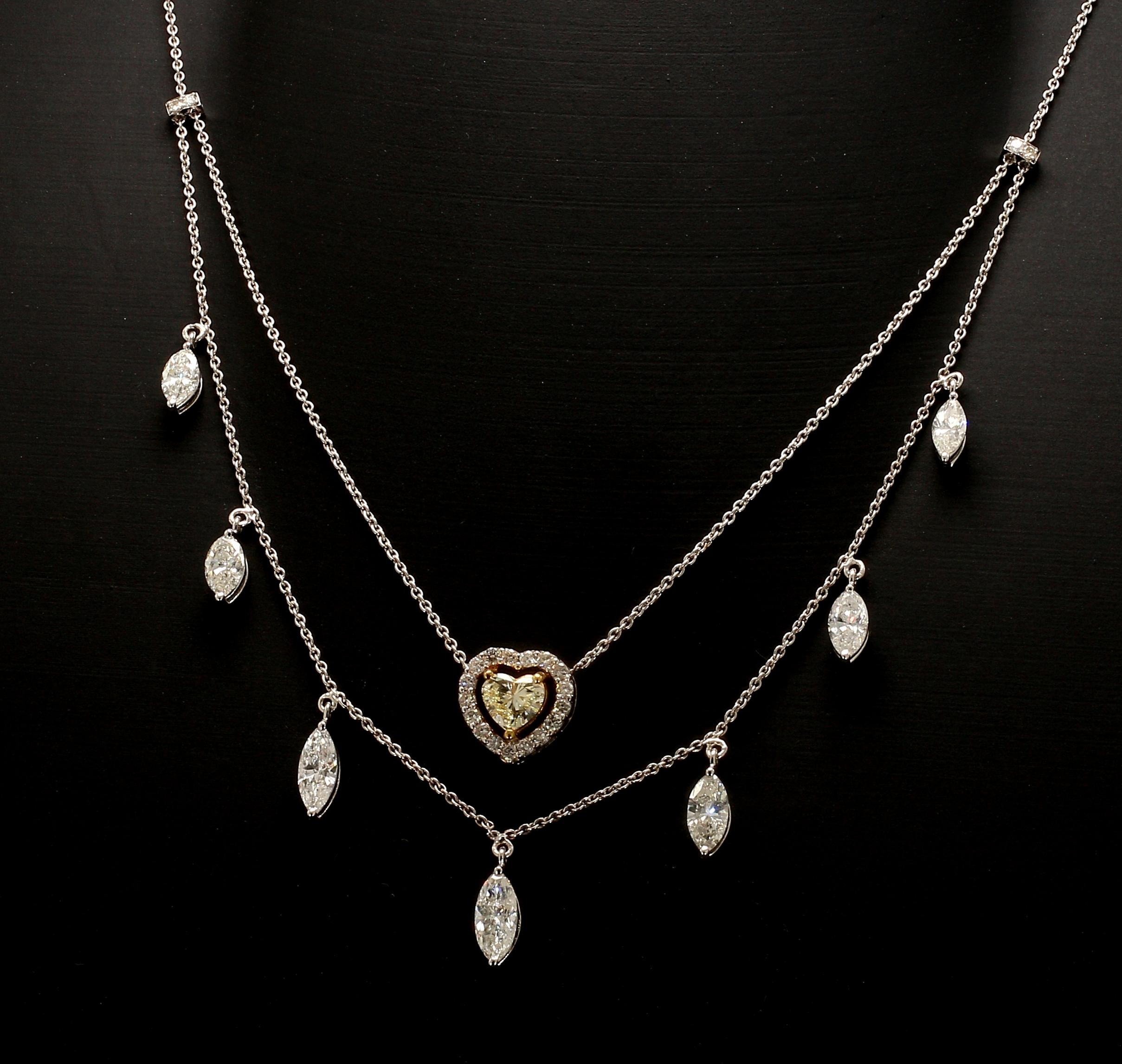 **All jewellery is one-of-a-kind**
**Hallmarked with diamond weight and gold purity**

Introducing our stunning two-row necklace, designed to make a statement and turn heads. The necklace features a beautiful center yellow heart with a halo of
