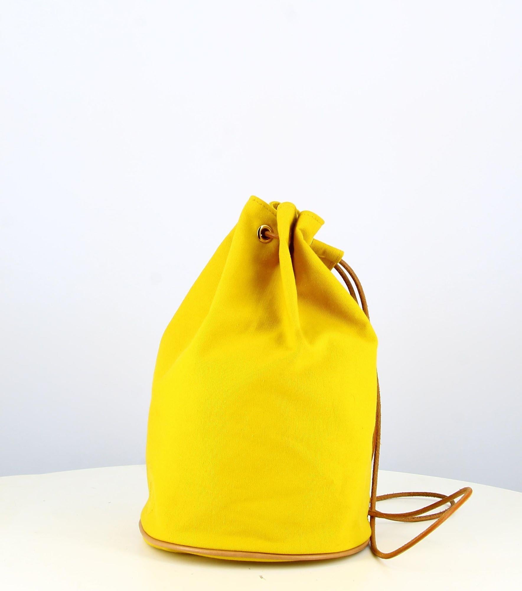 Yellow Hermes Fabric Backpack

- Good condition, shows slight traces of wear over time.
- Yellow Hermes Backpack
- Fine brown leather straps
- Inside : yellow fabric
- Packaging: Opulence luxuyr vintage dust bag
Shipping costs included in the price