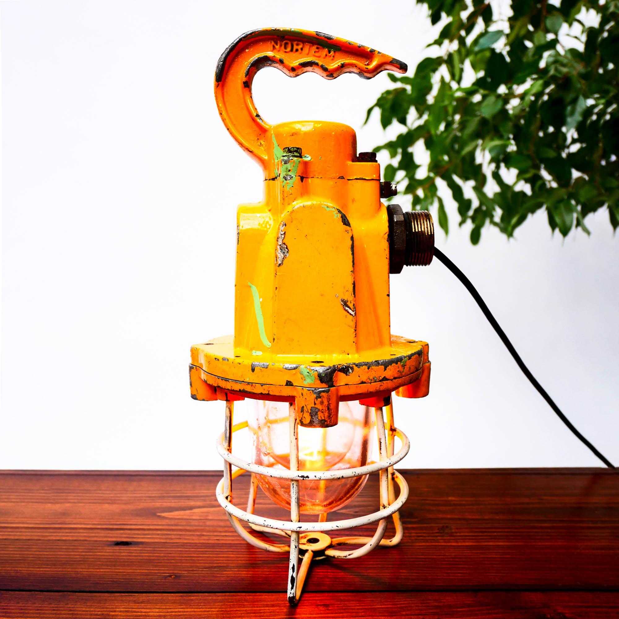 Vintage inspection lamp, made of cast iron aluminium. Original yellow color! Nice model with a robust and elegant handle. Can be put on a table or used as a ceiling lamp!