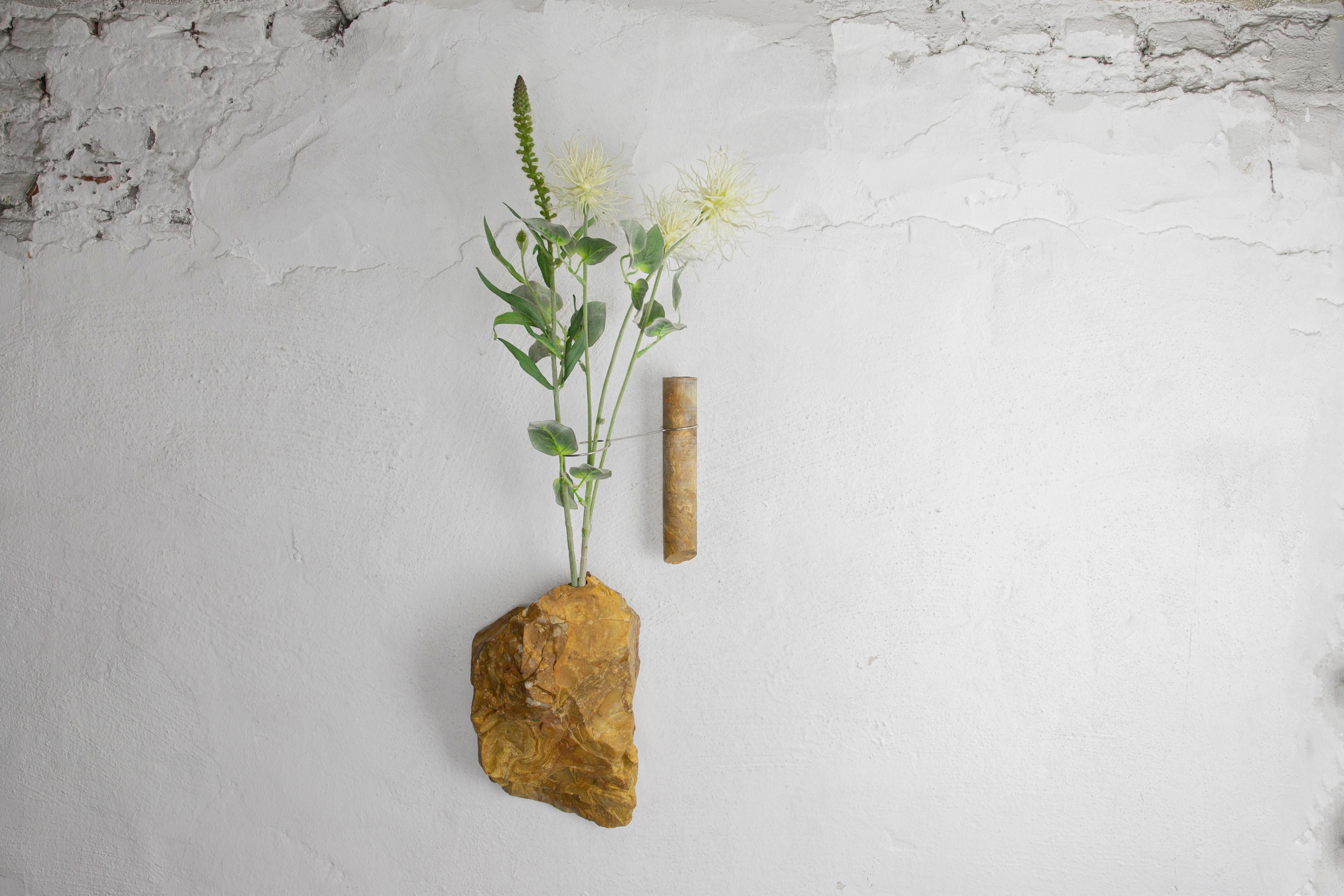Yellow Jasper Flower Wall Vessel by Studio DO
Dimensions: D 30 x W 16 x H 15.5 cm
Materials: Yellow Jasper, stainless steel.
7.5 kg.

Flowers are intrinsically connected with composition and earth.
Influenced by varied vessels from past to present