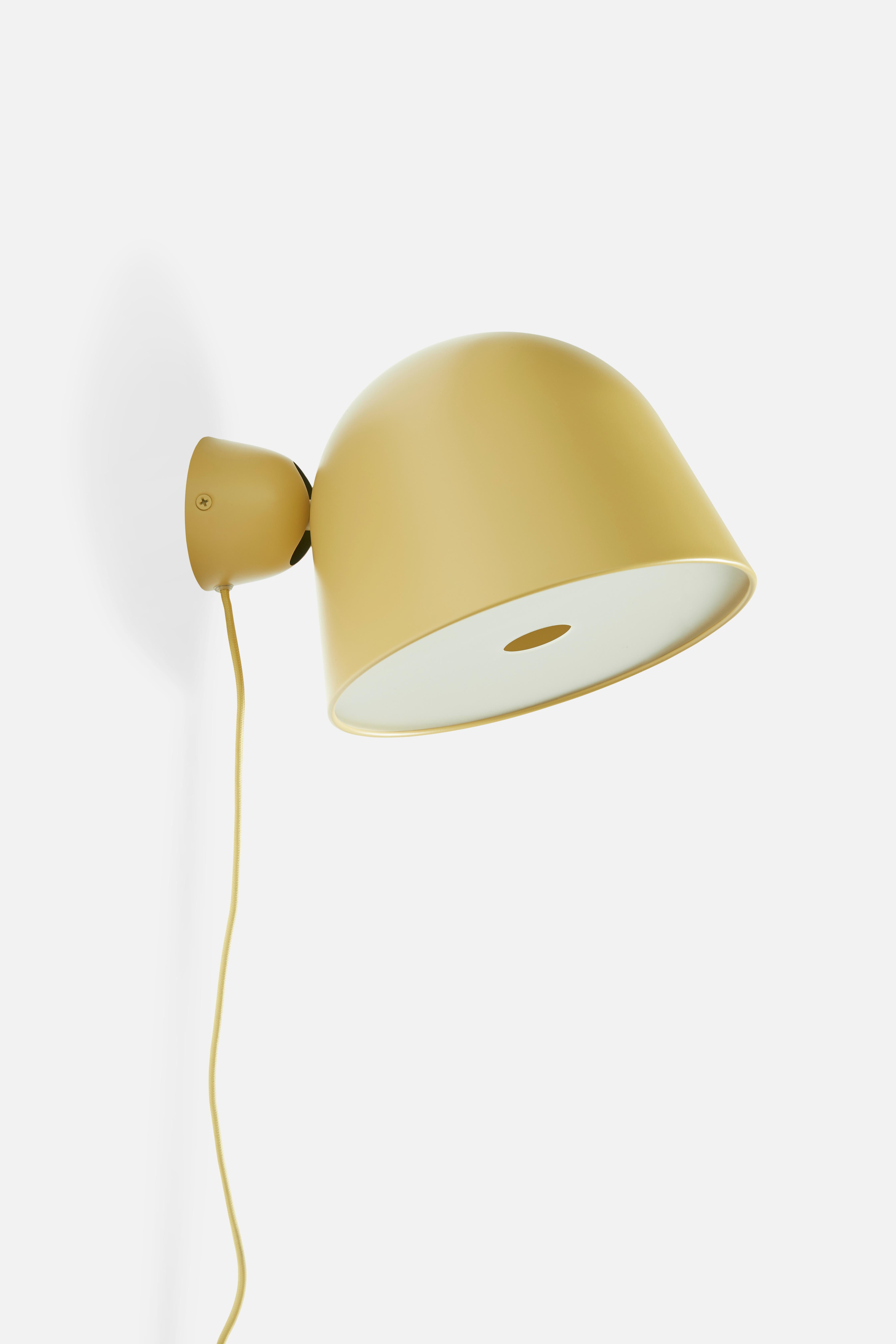Yellow kuppi wall lamp by Mika Tolvanen
Materials: metal.
Dimensions: D 24 x H 16.5 cm
Available in black or mustard yellow.

Mika Tolvanen is a renowned Finnish designer. After graduating from The Royal College
of Art, London, he established