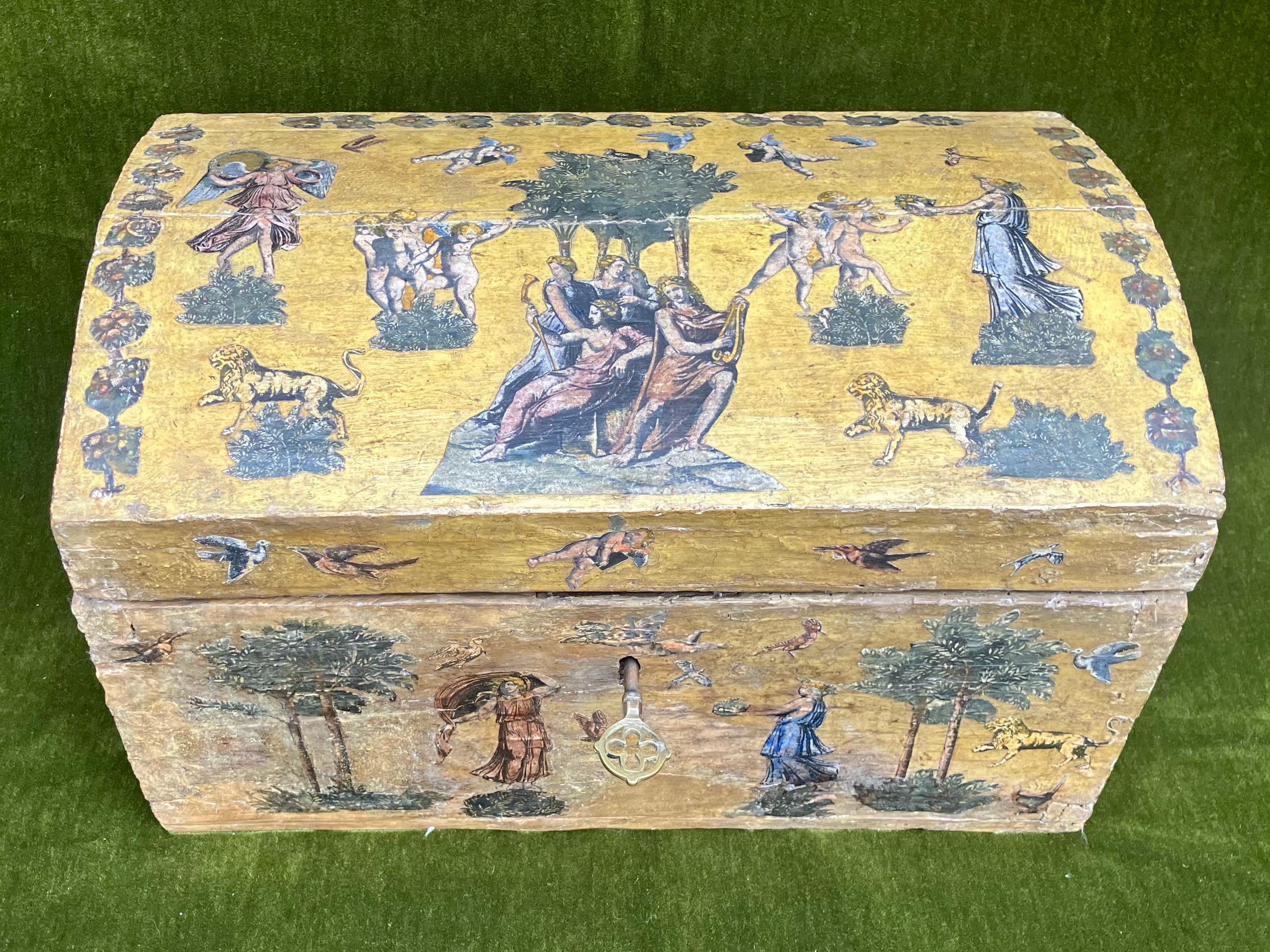 Yellow lacca povera box. Late 17th century chest with early 19th century lacca povera decalcomania decorations with angels, birds, lions, flowers, and trees; with original hardware and associated key. Italy 17th century and later

Dimensions: 16