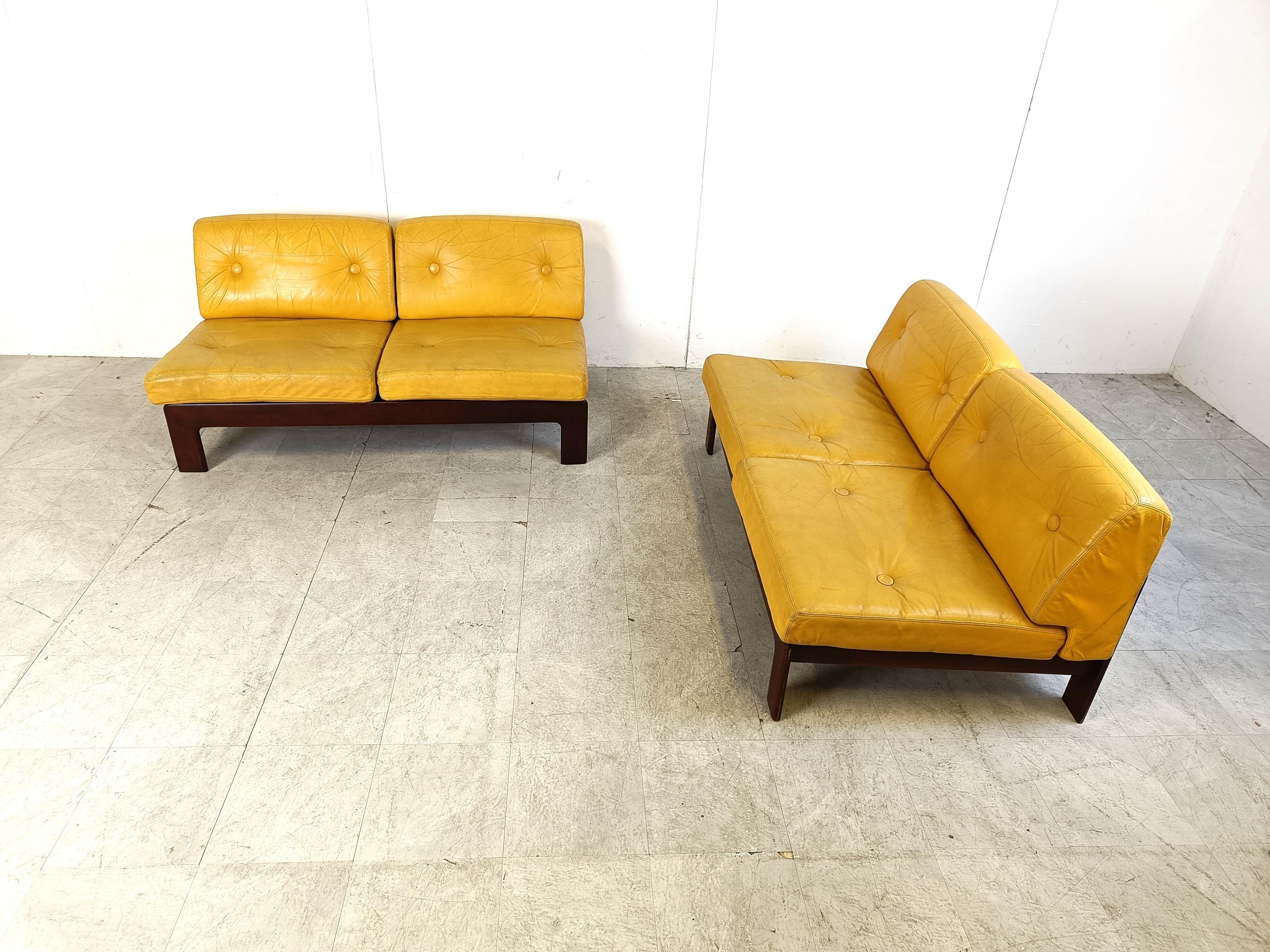 Yellow leather sofa set by drulet.

Wooden frames with yellow leather cushions.

Timeless mid century pieces.

1960s - Switzerland

Dimensions of each element:
Height: 70cm
Width: 70cm
Depth: 82cm
Seat height: 40cm

Ref.: 305252

*Price is for the