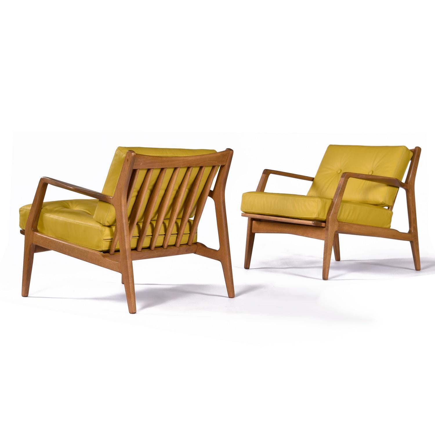 Pair of Mid-Century Modern Number 596 lounge chairs designed by Lawrence Peabody for Selig. Professionally reupholstered in full grain flaxen-yellow leather. These timeless lounge chair exudes the quintessential Mid-Century Modern style that has