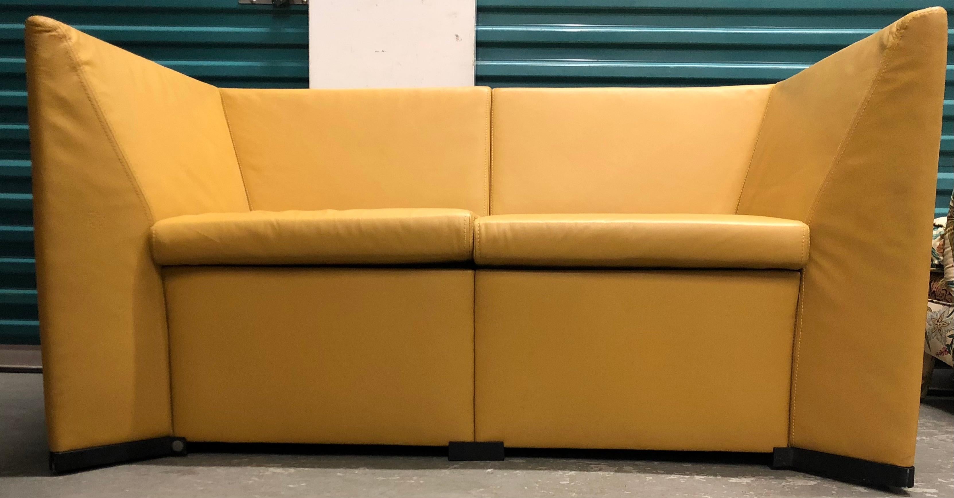 Yellow leather loveseat two-seat sofa Osvaldo Borsani Italian Modern. Rare leather loveseat designed by the Centro Progetti lead by Osvaldo Borsani for the famed Tecno Company (SPA) Italy. Tecno was founded in in 1952.
Dimensions: 54
