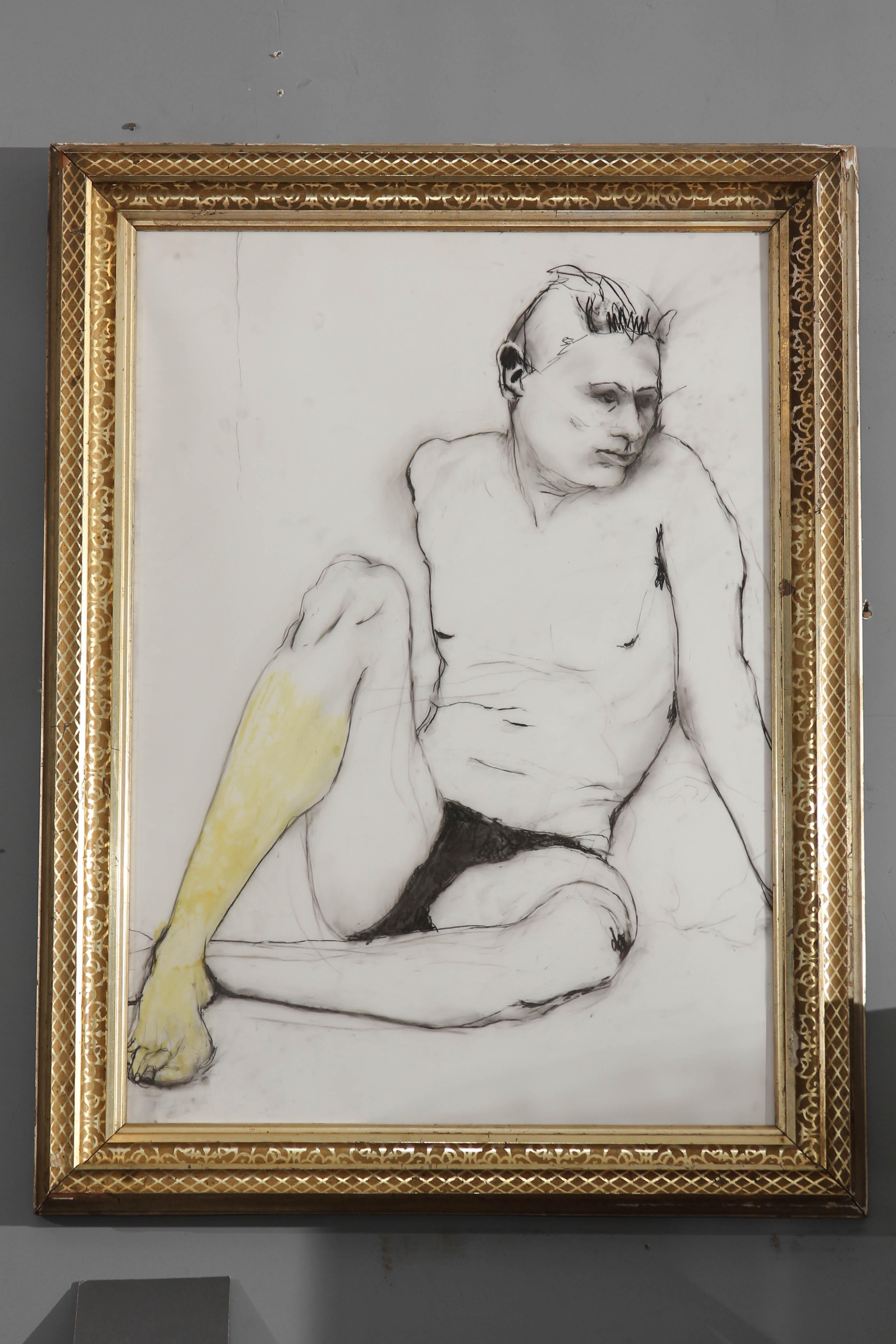 1980s black and white drawing of young man accented with a yellow leg. Framed in 19th century gilt frame.