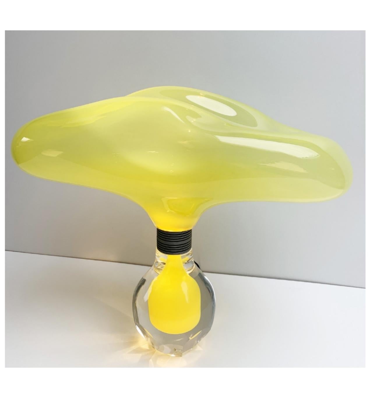 Yellow Love Potion by Mark Sturkenboom
Size: 35 x 40 x 20 cm, aprox 4 kg
Material: mouth blown glass, Facetted and polished glass dimmable led lamp


Love potion is a series of mouth blown and handcrafted glass bottles that hold an elixir based on