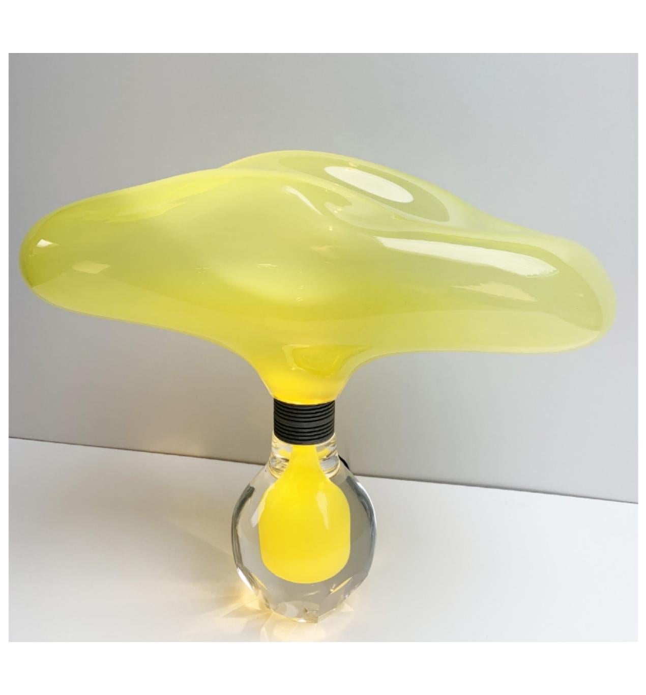 Yellow Love Potion by Mark Sturkenboom
Size: 35 x 40 x 20 cm, aprox 4 kg
Material: mouth blown glass, Facetted and polished glass dimmable led lamp


Love potion is a series of mouth blown and handcrafted glass bottles that hold an elixir based