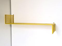 Yellow metal wall shelf by Mathieu Matégot for Artimeta, The Netherlands 1950's