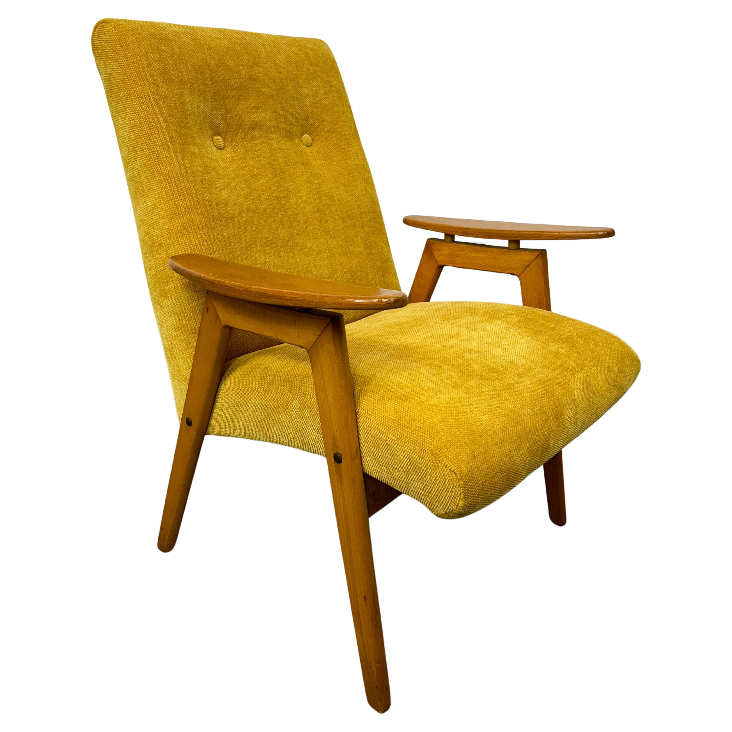 Yellow mid-century design armchair by Jaroslav Šmídek 
