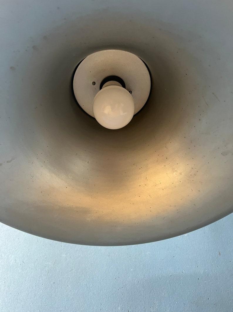Lampada a sospensione a forma di UFO giallo di metà secolo, anni '70 In condizioni ottime in vendita a ROTTERDAM, ZH