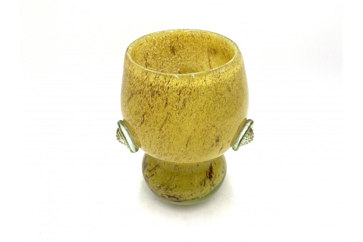 Iconinc Mid-Century Modern design decorative vase. The vase designed by Wieslaw Sawczuk from the 1970s. It comes from the Lysa Góra glassworks in Poland. Hand formed from heavy sodium glass. Yellow color with brown bits and decorative elements on