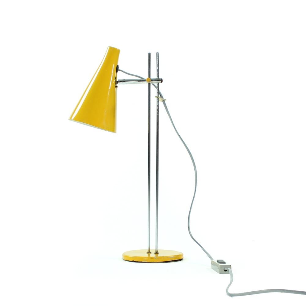 Beautiful table lamp designed by Josef Hurka for Lidokov in Czechoslovakia. Classical midcentury design with simple lines and beautiful details. Lacquered metal in yellow color. The chrome construction in excellent condition. The lamp is in very