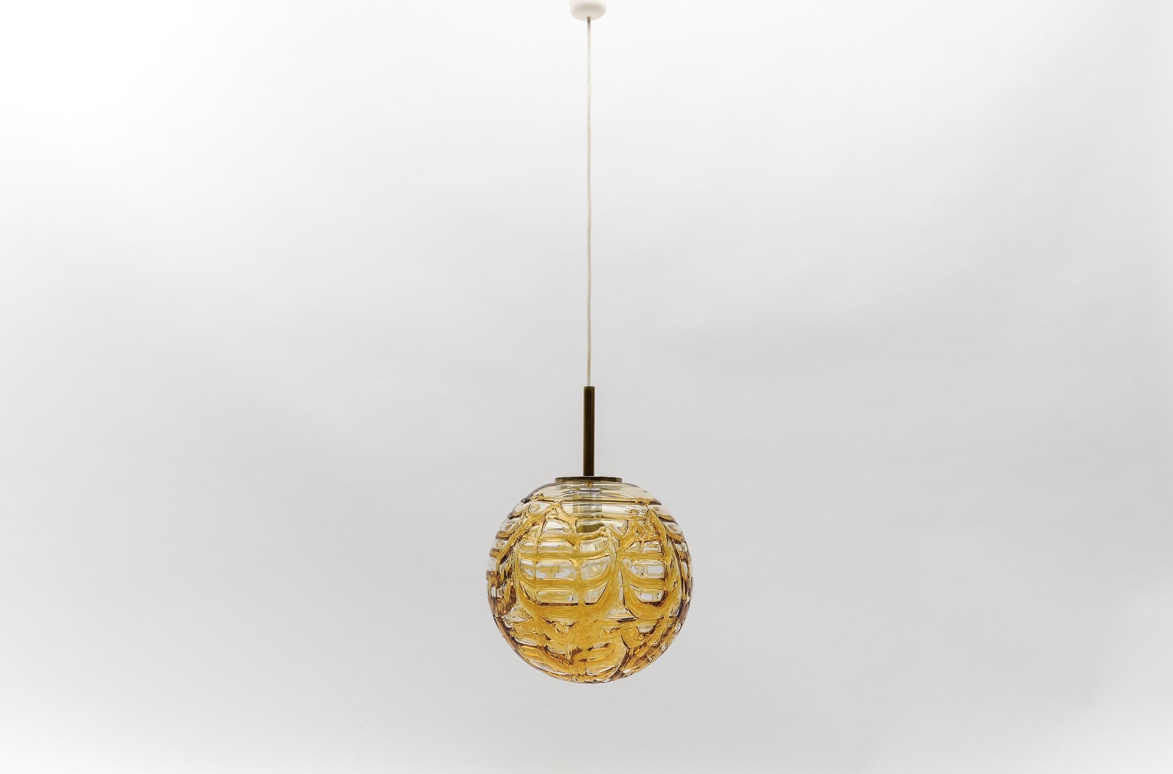 Lovely Yellow Murano Glass Ball Pendant Lamp by Doria, - 1960s Germany

Dimensions
Diameter: 11.81 in. (30 cm)
Height: 41.33 in. (105 cm)

One E27 socket. Works with 220V and 110V.

Our lamps are checked, cleaned and are suitable for use in the USA.