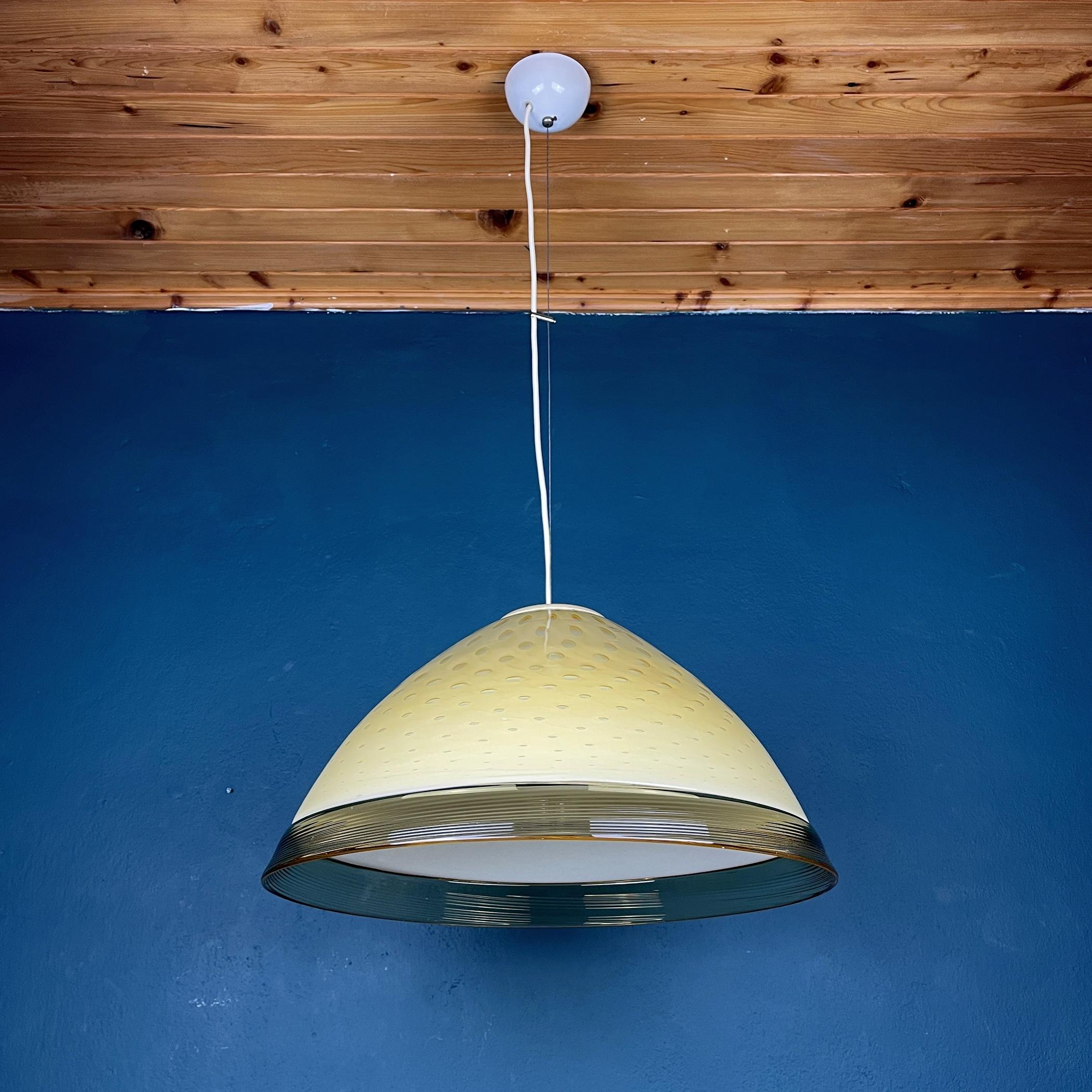 Mid-century yellow Murano glass pendant lamp Vetri Murano Venezia Italy 1970s. A hand-blown Murano lamp is a real work of art.
Excellent vintage condition! Max height with cable 95 cm. Chandelier weight 5.5 kg. Bulb E 27 required. Suitable for all
