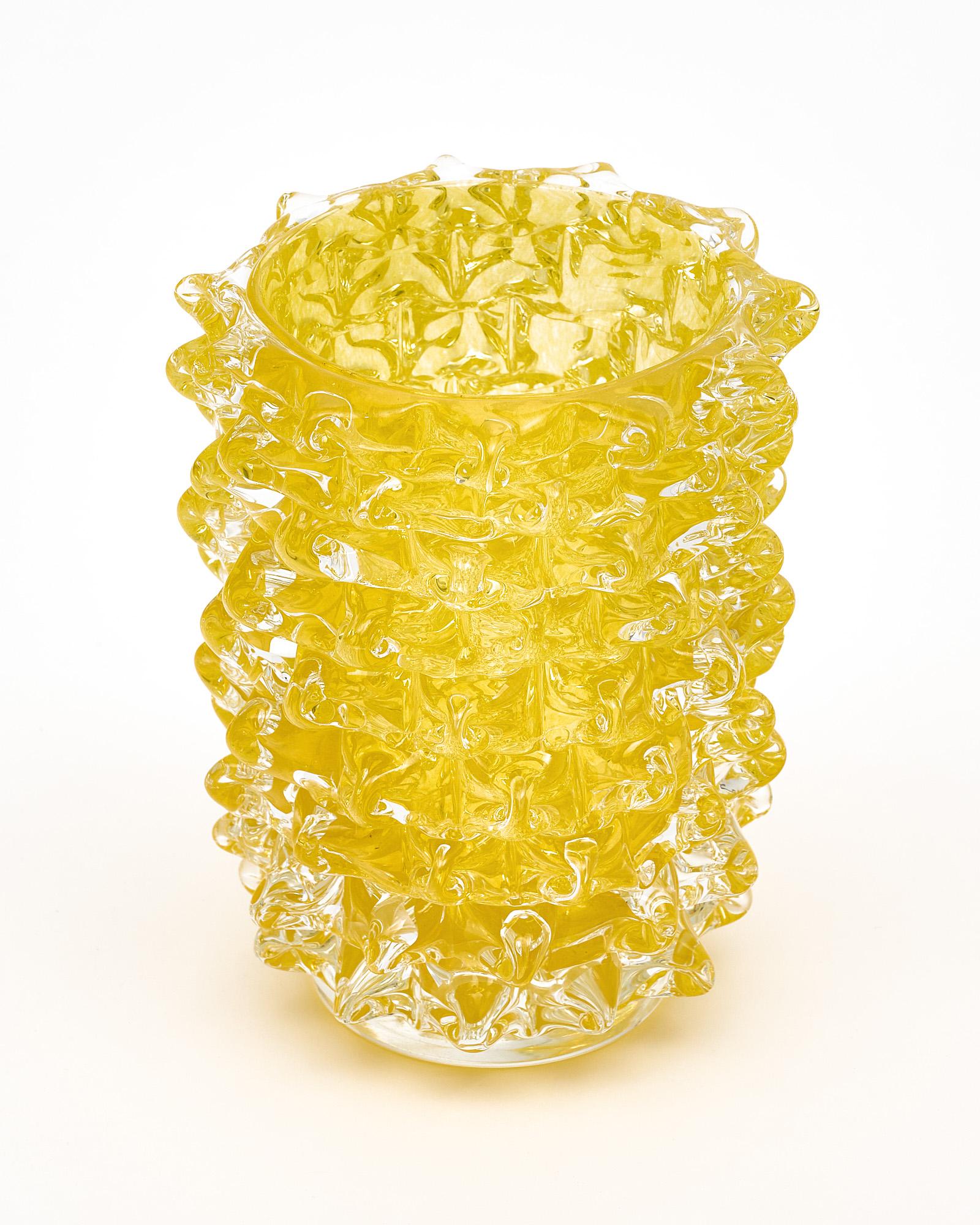 Murano glass vase, Italian, from the island of Murano. This hand-blown piece has a striking yellow color and is made with the rostrate technique.