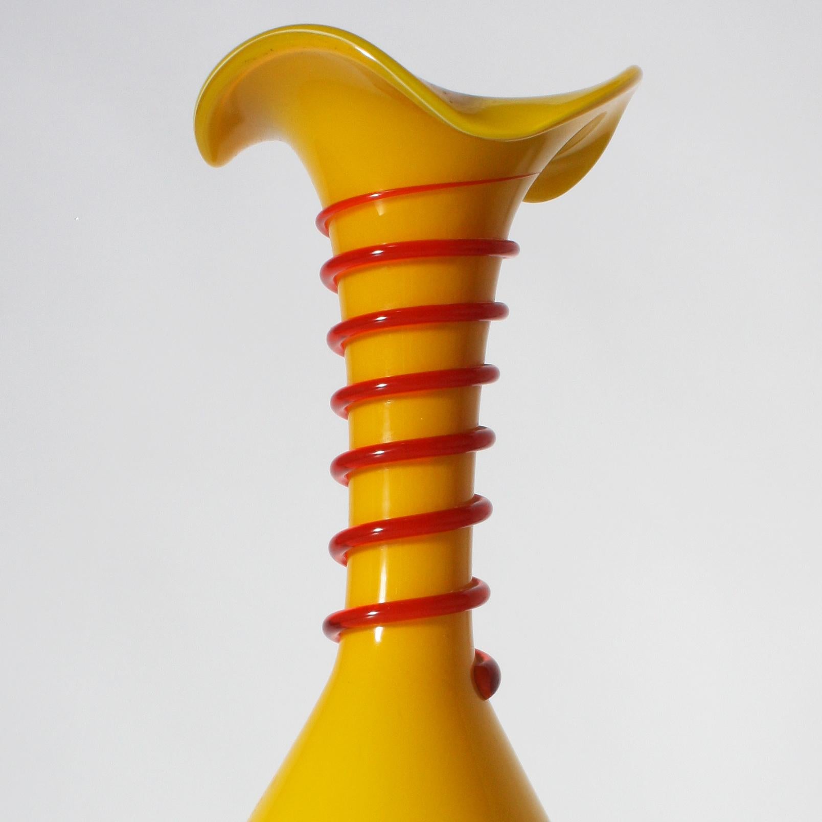Yellow Murano vase with red rings, circa 1950.