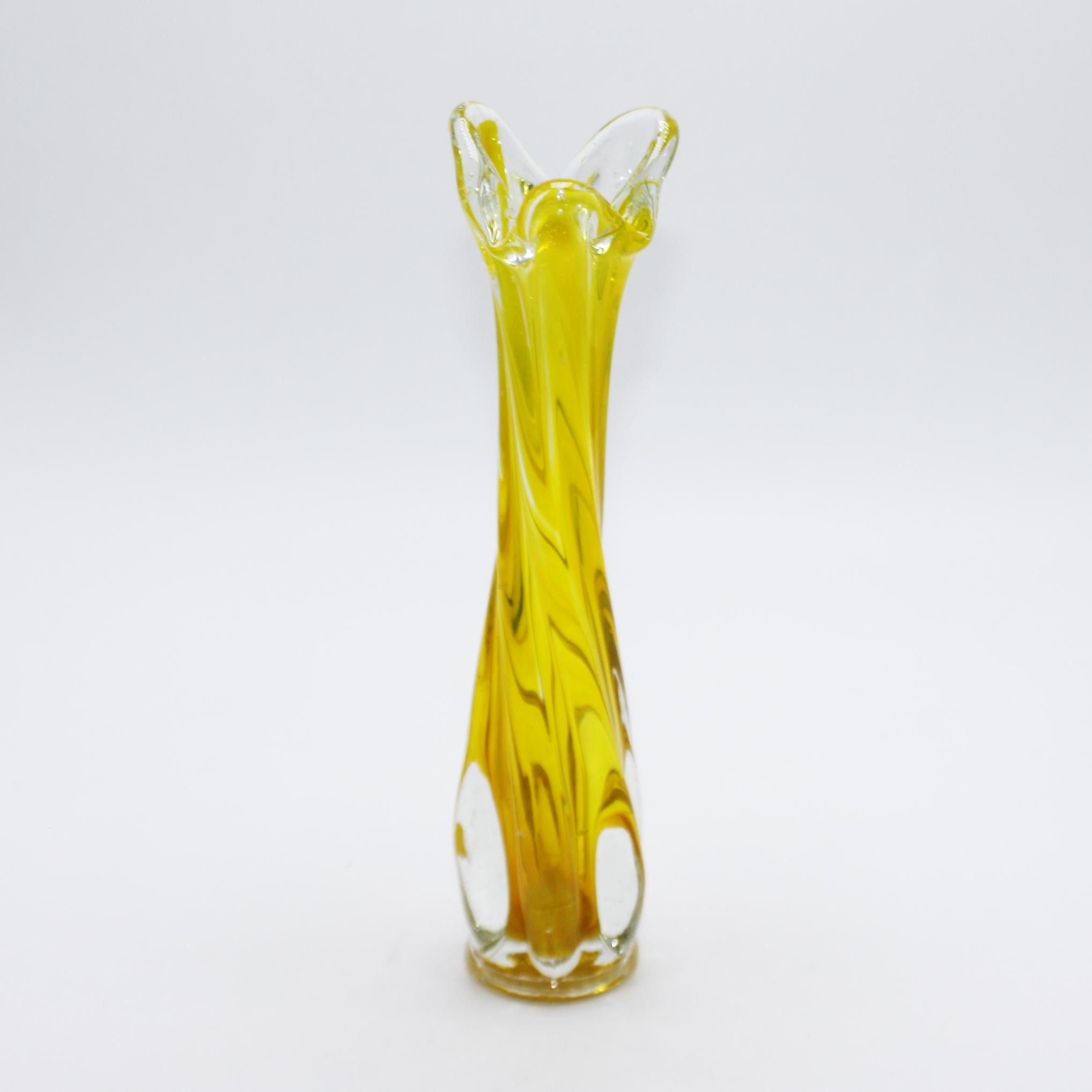 Yellow Murano vase with twisted stem and petal mouth, circa 1950.