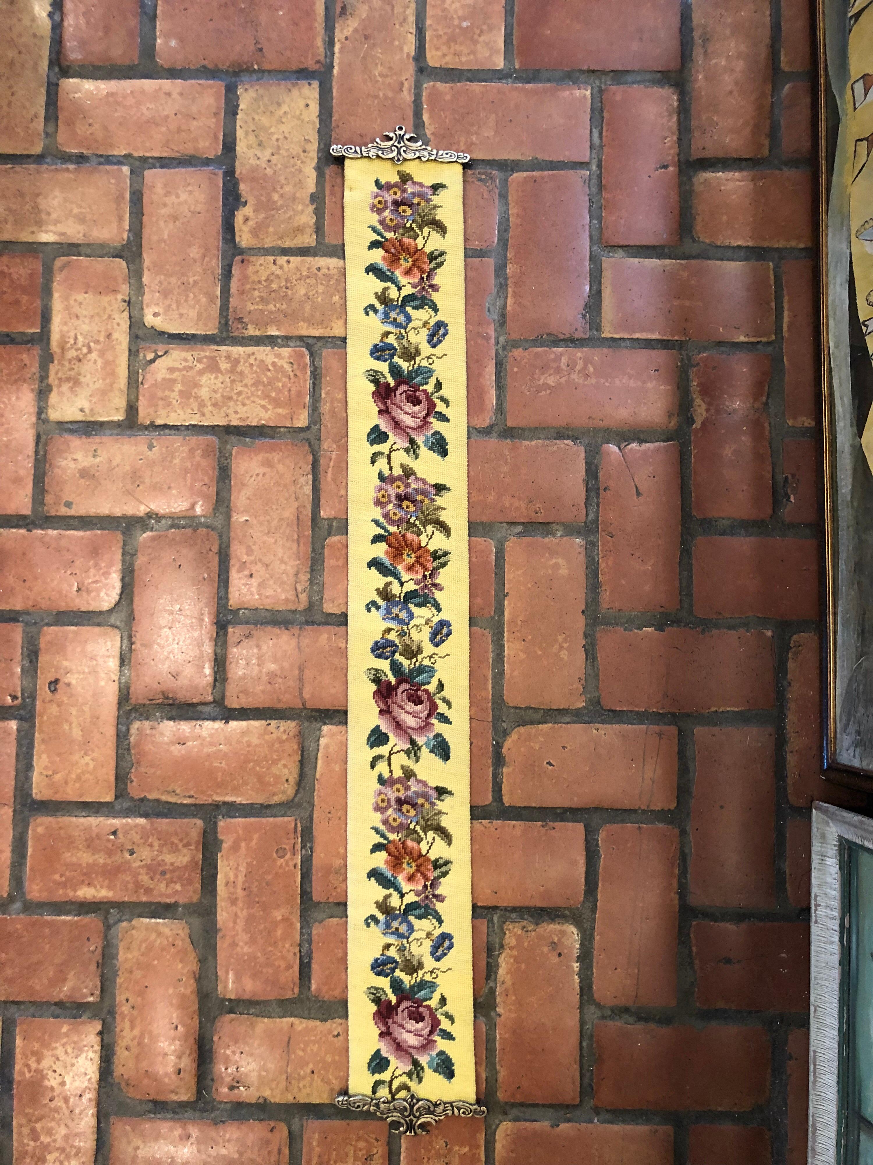 Antique Yellow needlepoint bell pull with brass ends. Ready to hang. This item will parcel ship for $45.