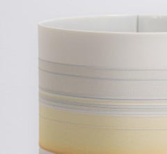 Vasija de porcelana amarilla/naranja de Rachel Foxwell