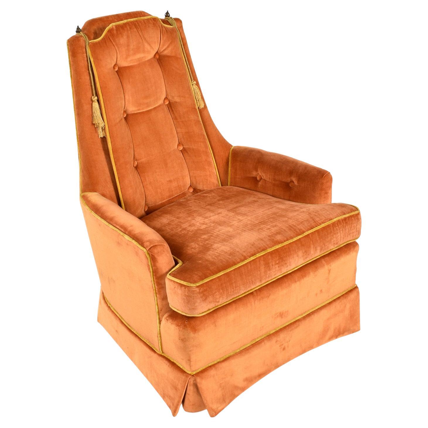 Exceptional pair of original vintage 1970s tufted armchairs by McAfee. These time capsule quality chairs feature their original orange velvet fabric. The color and style is oh-so 70s! If you’ve seen the movie “Dumb and Dumber” you might liken these
