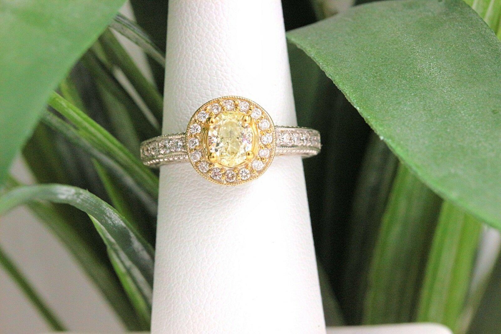 Yellow Oval Diamond Engagement Ring 0.93 Carat in 18 Karat White Gold For Sale 6