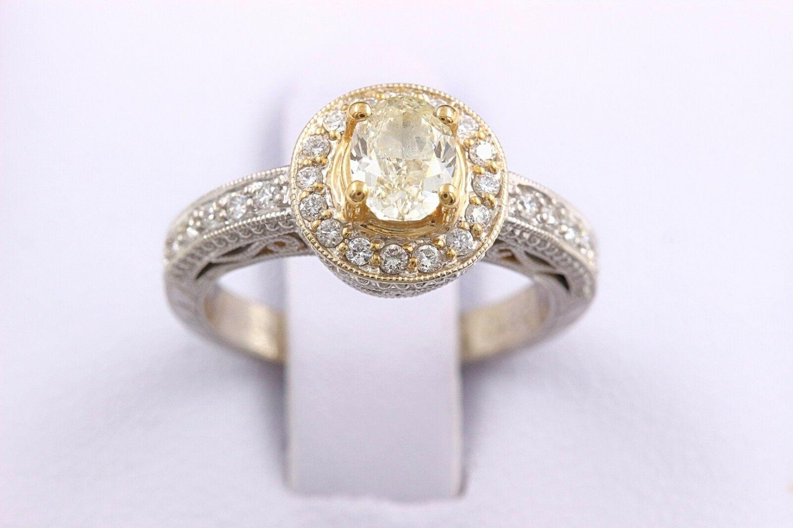 Women's Yellow Oval Diamond Engagement Ring 0.93 Carat in 18 Karat White Gold For Sale