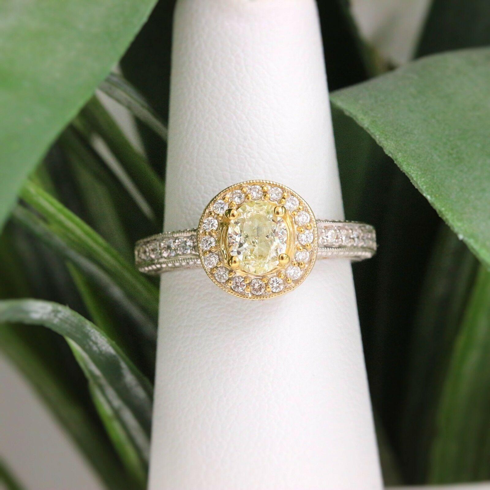 Yellow Oval Diamond Engagement Ring 0.93 Carat in 18 Karat White Gold For Sale 4