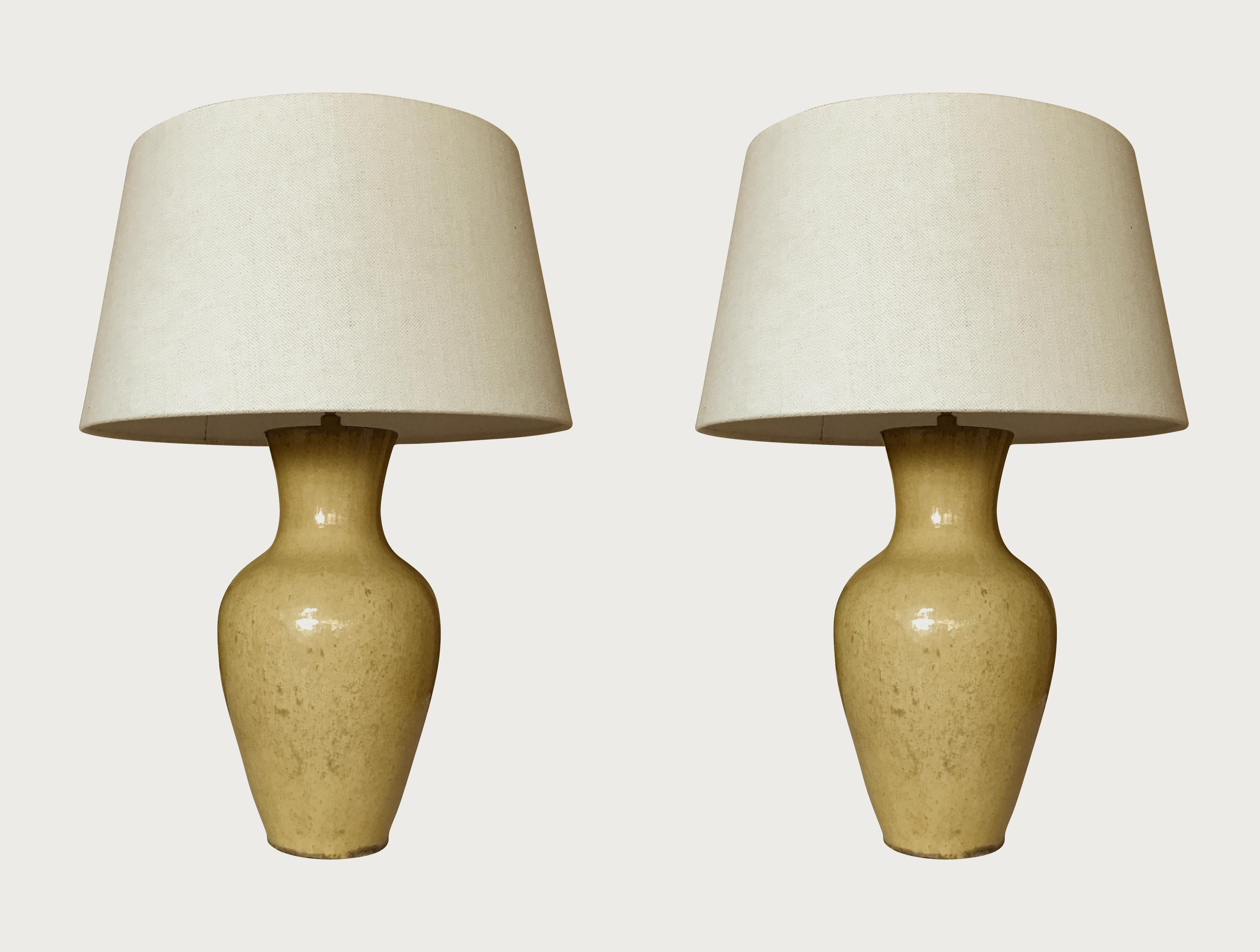 Contemporary classic shaped pair yellow terra cotta lamps with light brown speckles.
New Belgian linen shade.
Overall height including shade 22.5