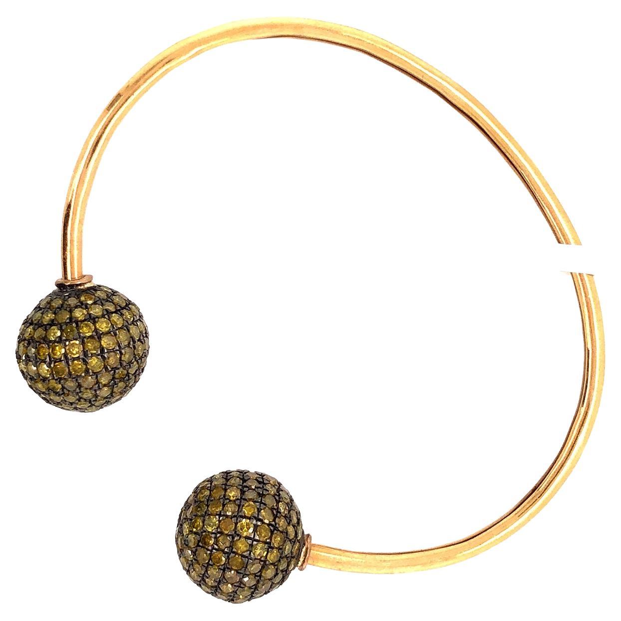 Bracelet jonc souple en or 18 carats avec boule en diamants jaunes pavés