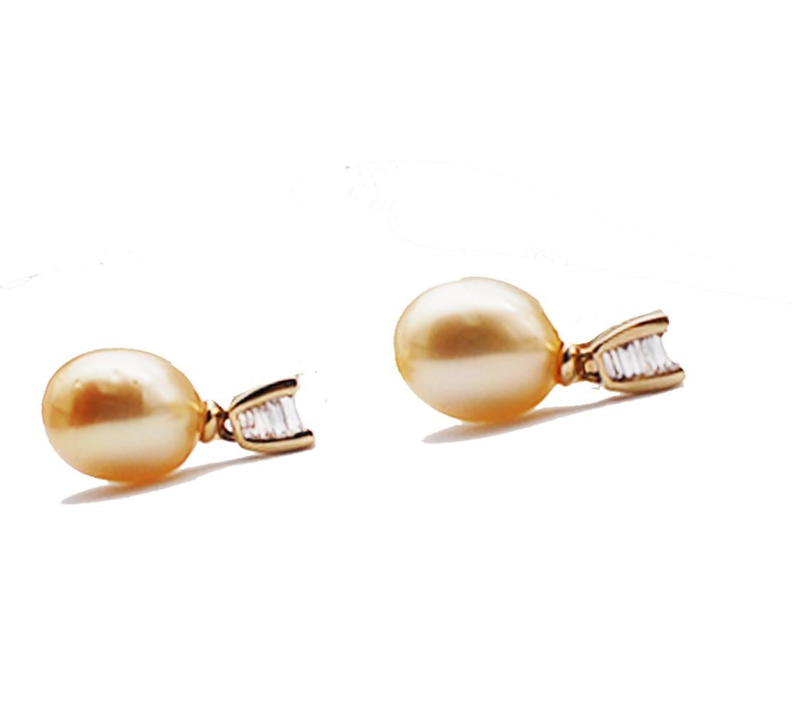 Contemporary Yellow Pearl and .50 Carat Baguette Diamond Hanging Earrings VS Quality For Sale