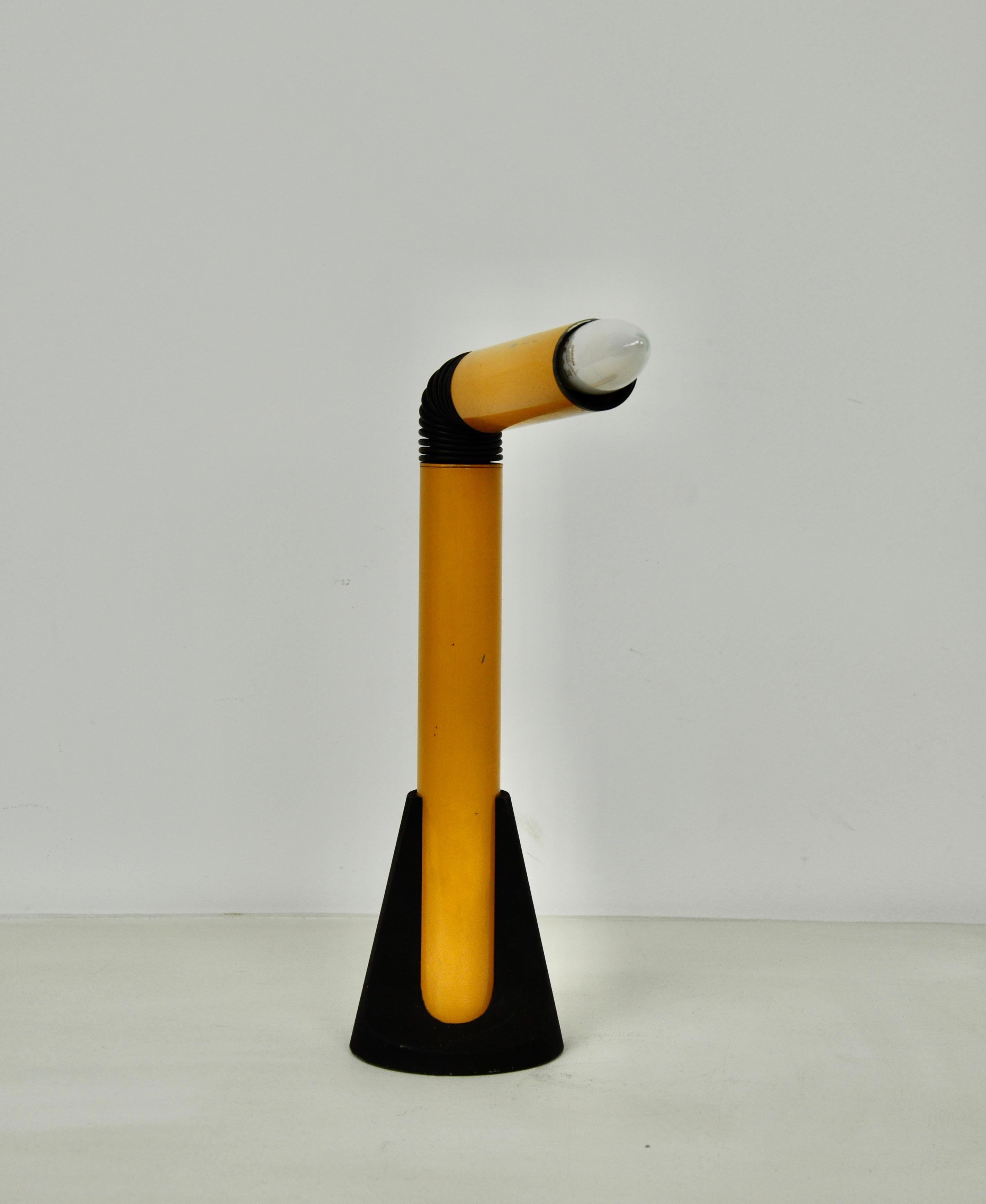 Metal lamp in yellow and black color. Wear due to time and age of the lamp (see photo).