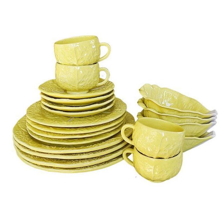 A complete set of yellow Hollywood Regency lettuce or cabbage ware by Secla. This set includes a total of 20 pieces with dinner service for four. The set includes four dinner plates, four salad plates, four bread plates, four elongated soup bowls,