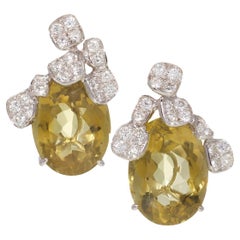 Yellow Quartz and Diamond earrings set in White Gold