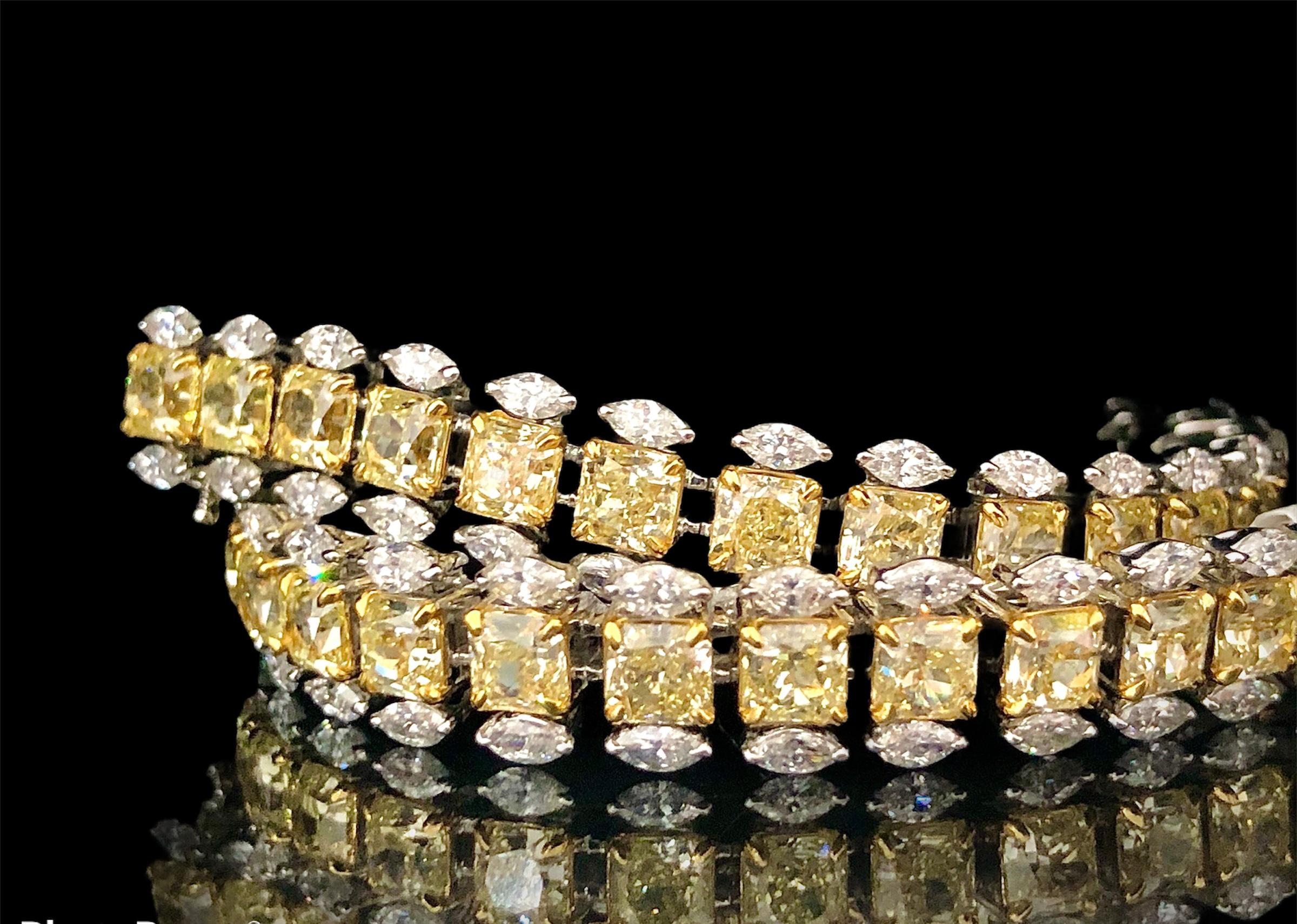 Luxurious tennis bracelet studded with perfectly crafted & calibrated yellow radiant natural diamonds. The yellow diamonds are surrounded by flawless white marquise diamond. Very flexible and perfect for all hands. 

Made exclusively at the state of