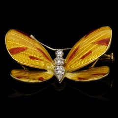 Broche papillon Boucheron en émail jaune rouge et diamants Prov. Comte Mountbatten