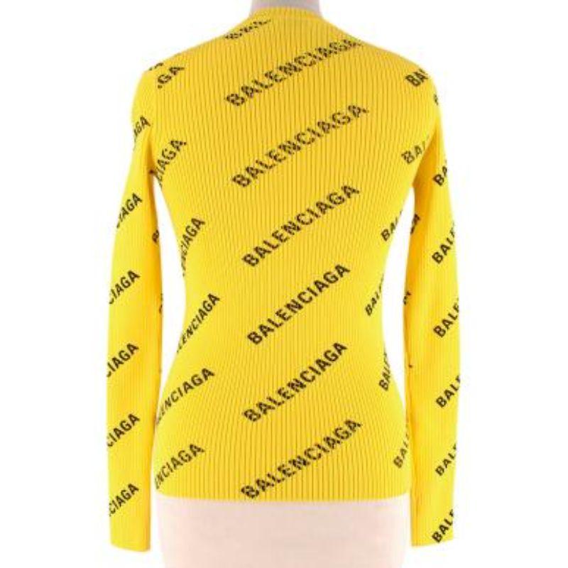 Balenciaga yellow rib-knit Allover Logo top
 

 - Stretchy ribbed knit
 - Bold yellow hue, with black logo printing
 - Crew neck
 - Long sleeves 
 - Form fitting
 

 Materials: 
 100% Polyamide 
 

 Made in Italy 
 

 Dry clean only 
 

 PLEASE