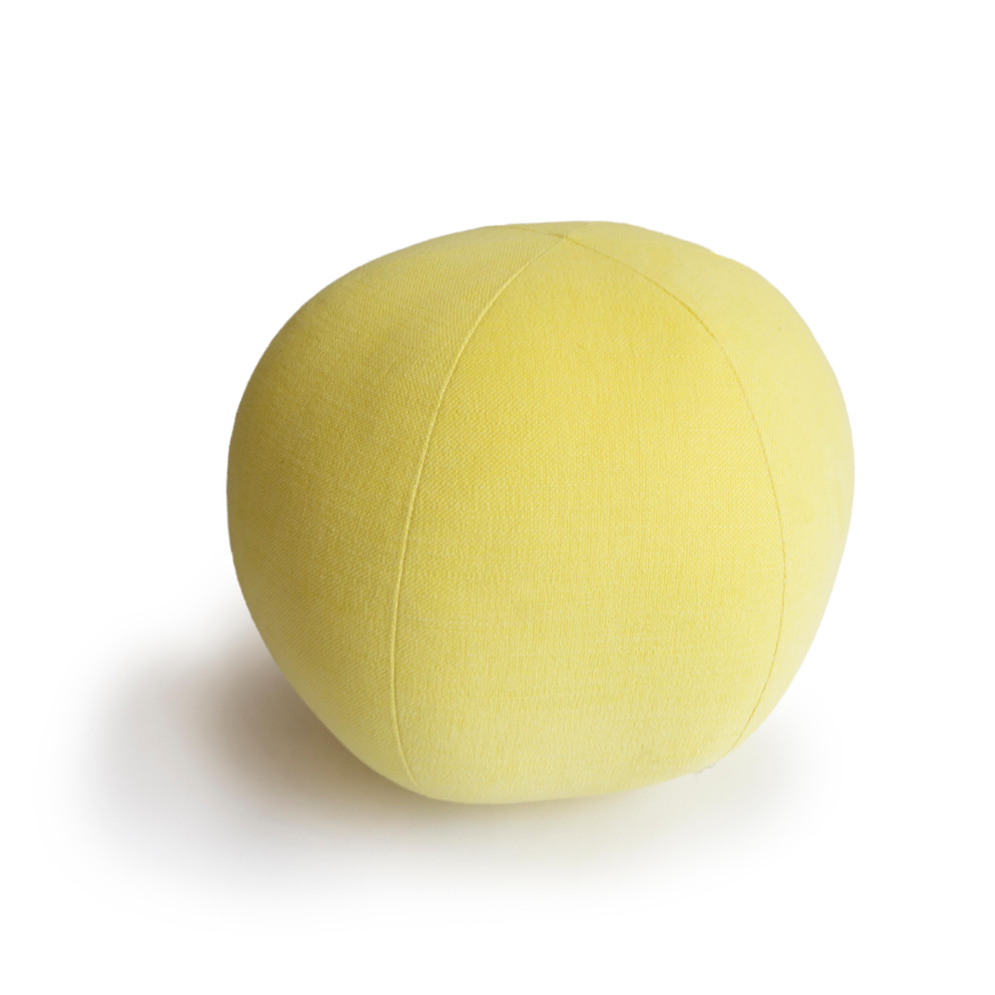 This hand sewn round ball throw pillow was handmade in a yellow cotton fabric. All pillows are made at our studio in Norwalk, Connecticut. 
Made to Order.

Measurements: 9