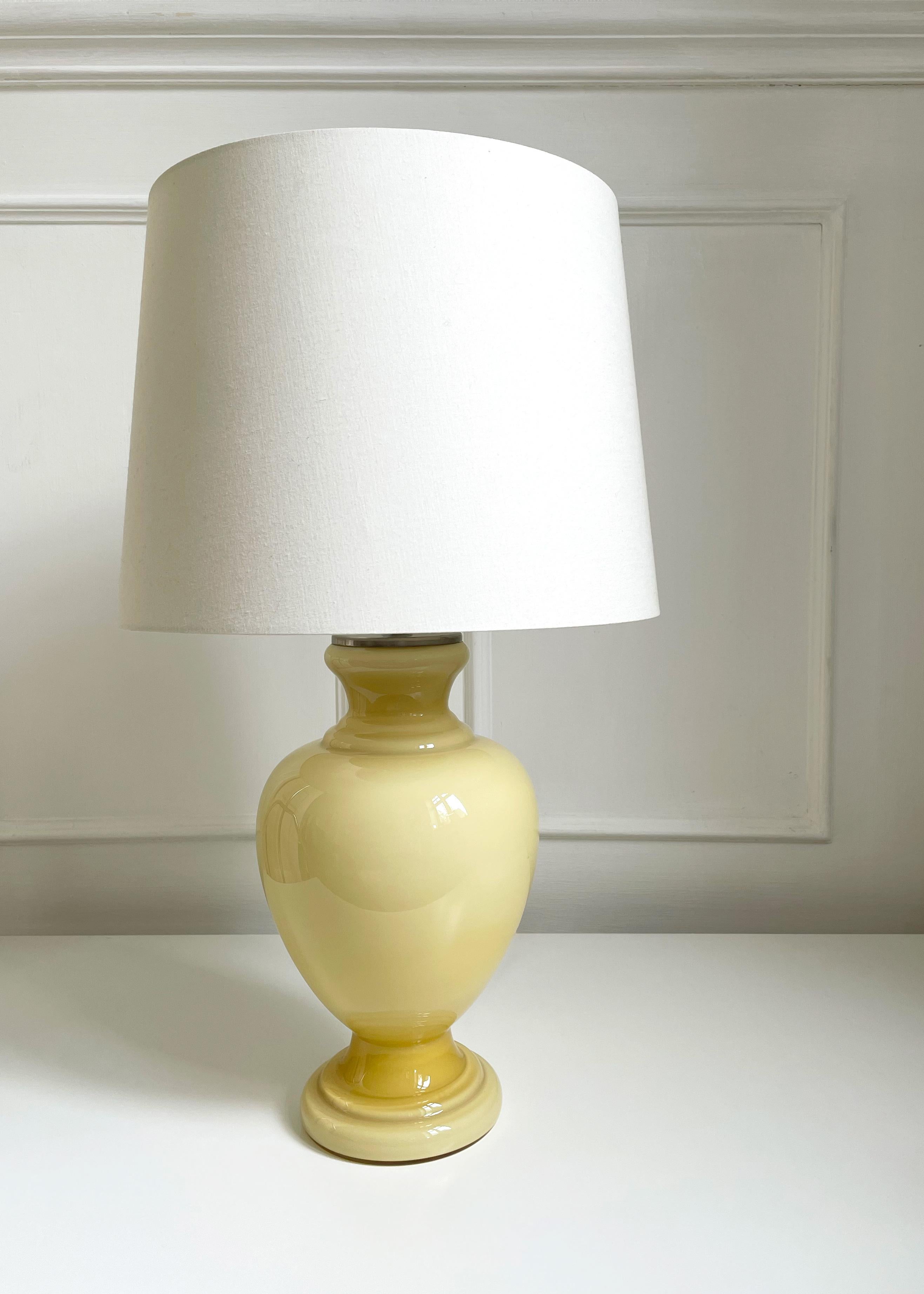 Rare color, classic piece. Large, elegant light yellow glass table lamp designed by Anne-Grethe von Halling-Koch for Royal Copenhagen and Holmegaard Glassworks in the late 1980s-early 1990s. No longer in production. White opaline glass with yellow